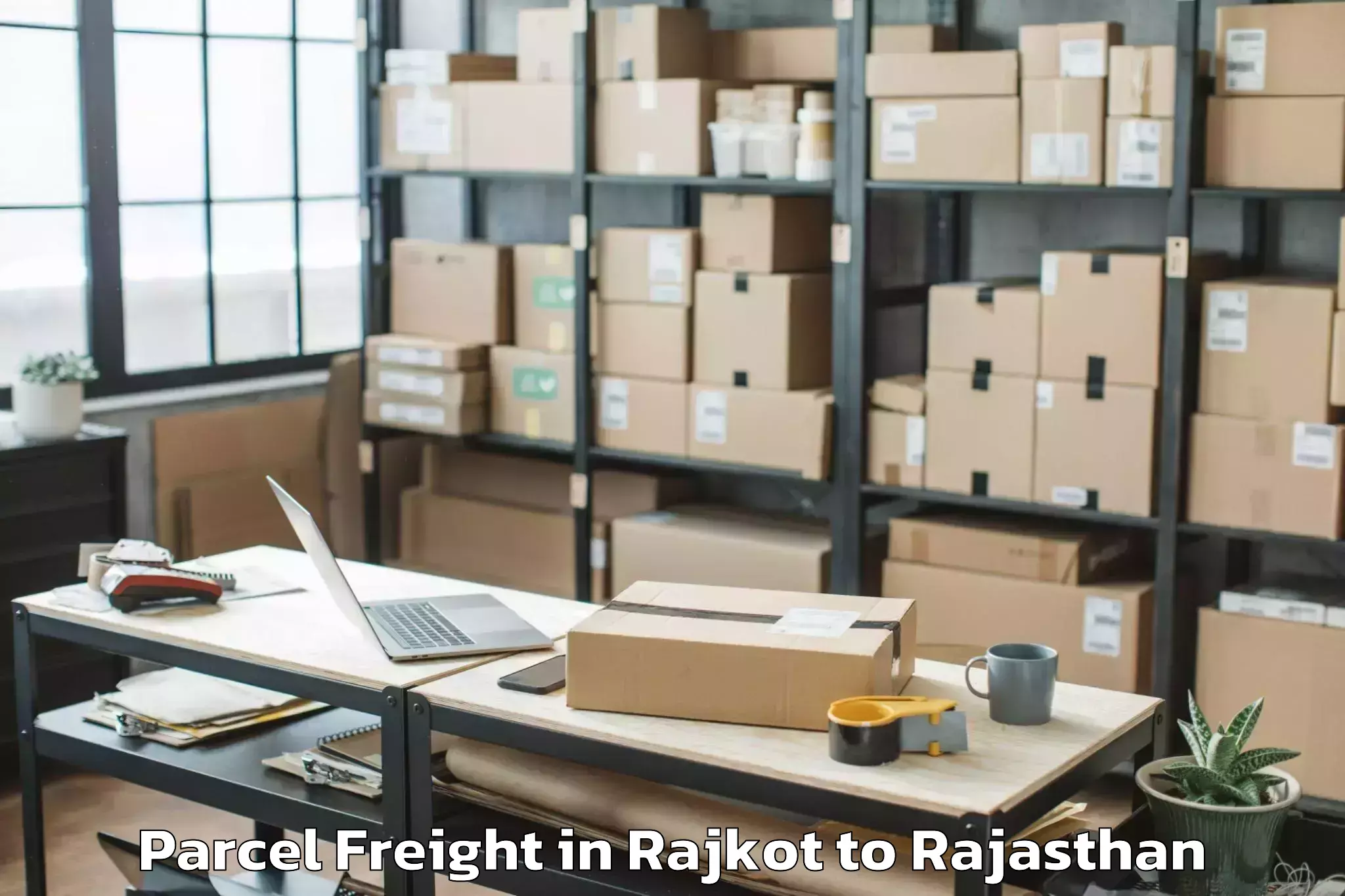 Book Rajkot to Bagru Parcel Freight Online